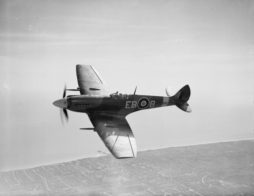 Supermarine Spitfire F Mark XII, MB882 EB-B, of No. 41 Squadron RAF based at Friston, Sussex, in flight over Eastbourne.